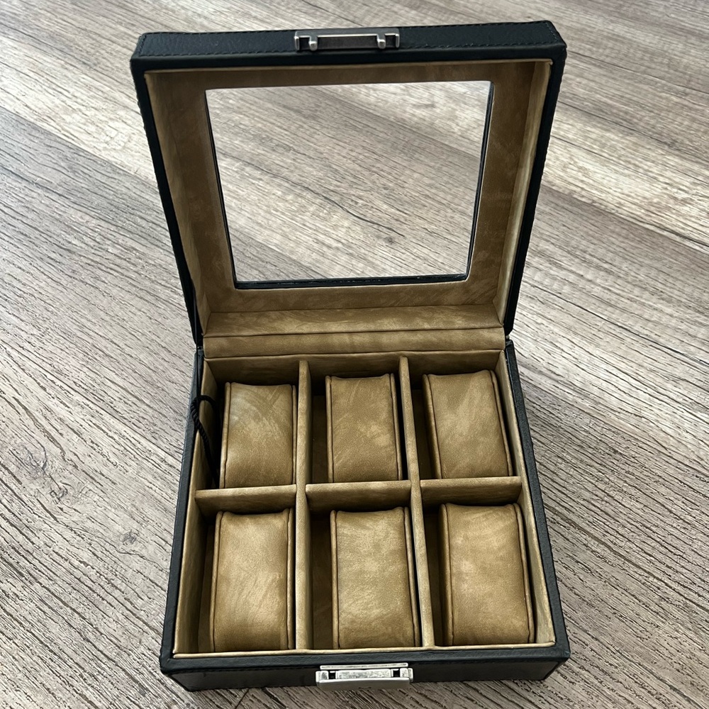 Black leather Fossil watch box